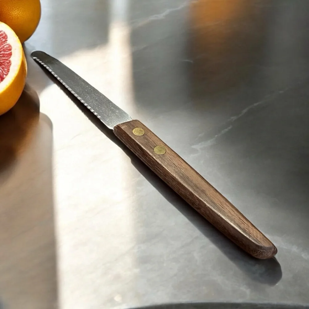 Vintage Geneva Forge stainless steel grapefruit knife.